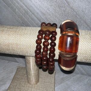 2 brown bracelets